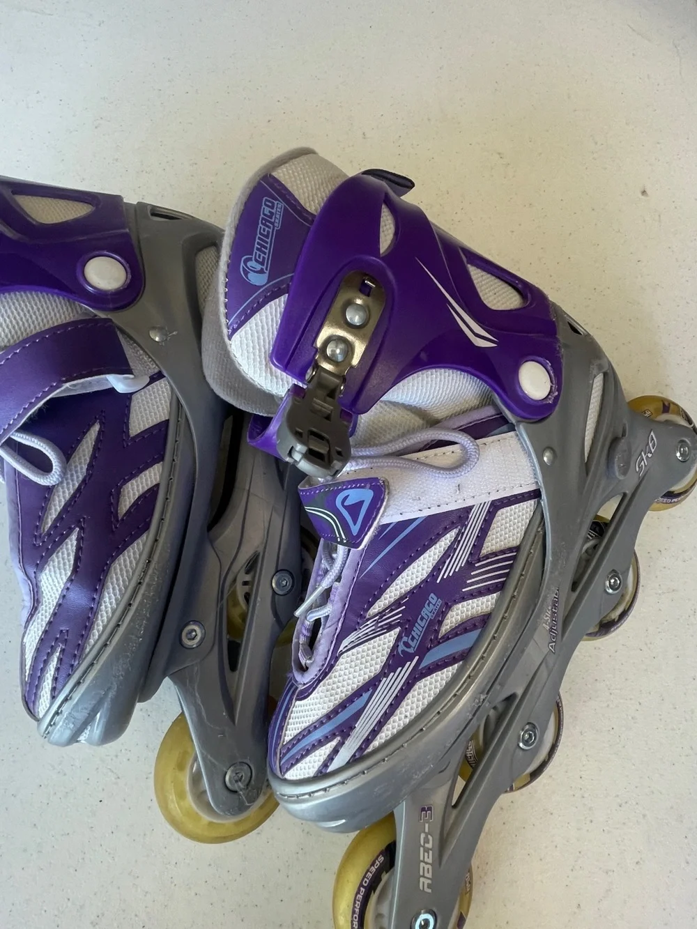Women’s Adjustable Inline rollerblades- Purple/White. Size Girl 5-8 US